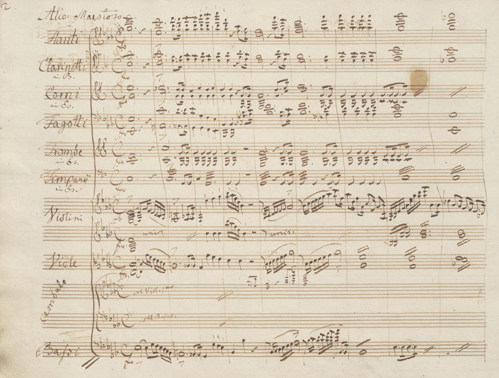 Carl Maria von Weber: 2. Klavierkonzert Es-Dur op. 32, Seite 2. Der Vorsatz zeigt die im Konzert  verwendeten Instrumente. Weber schreibt hier „Cembalo“, gemeint ist das Soloklavier